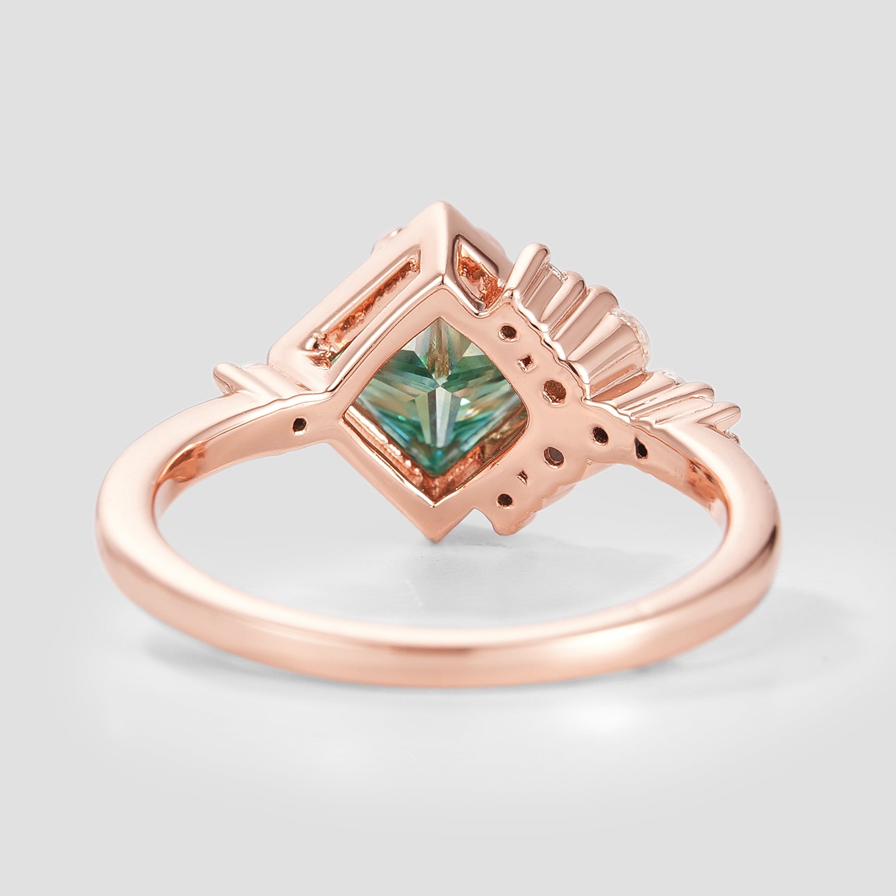 Rose gold engagement ring with green moissanite, princess cut