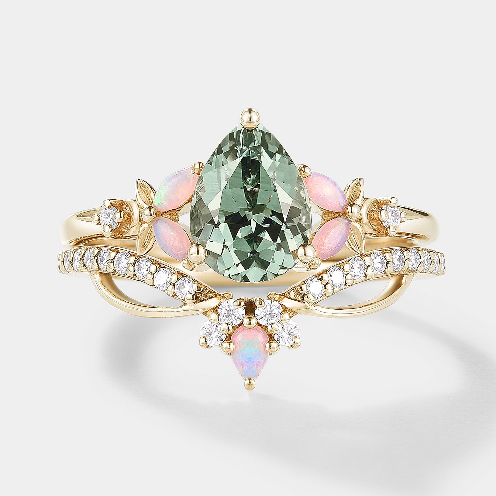 Nature-inspired green sapphire engagement ring set with opal accents