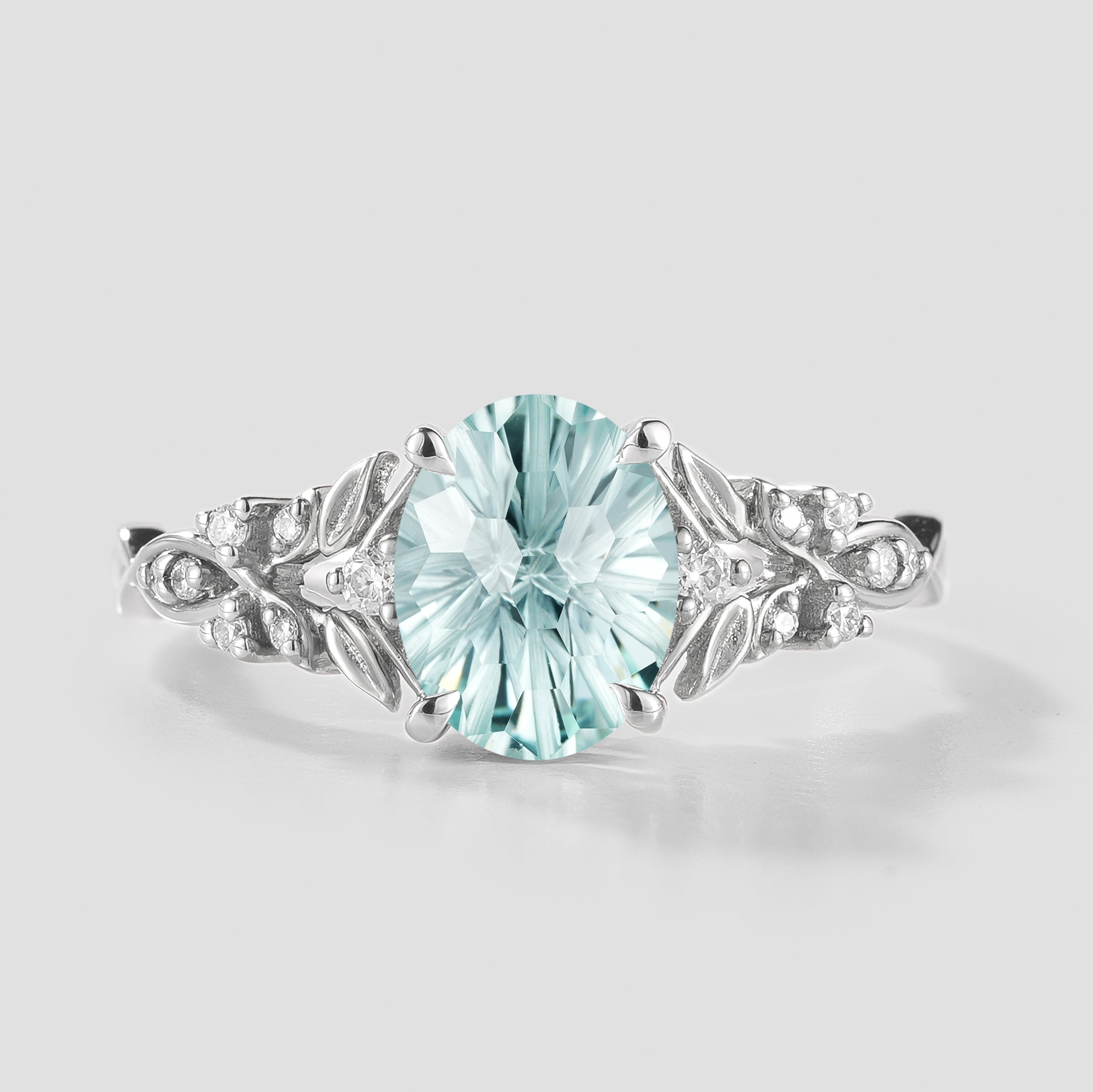 Aquamarine oval cut engagement ring with leaf design, Lahela Jewelry