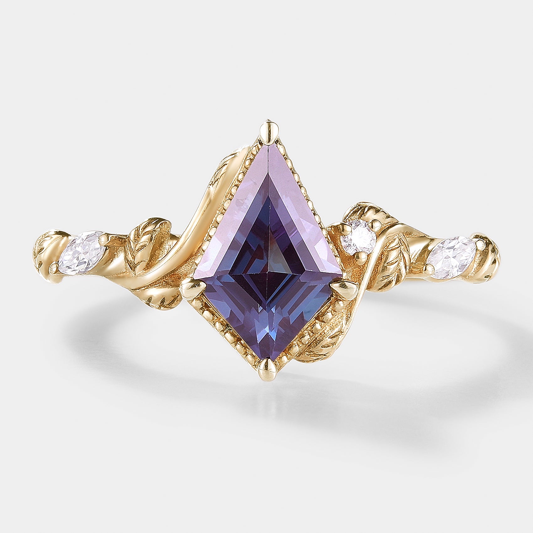 Nature-inspired Alexandrite engagement ring with leafy design