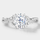 Oval moissanite engagement ring with leaf and bark design in white gold, bridal jewelry. Vintage style.