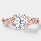 Oval moissanite engagement ring in rose gold with leaf and bark design, bridal jewelry. Vintage style.