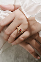 Yellow gold engagement ring with a coffin-cut lab grown ruby and moissanite accents, bridal set.