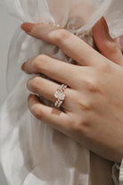 Emerald cut diamond engagement ring, leaf design