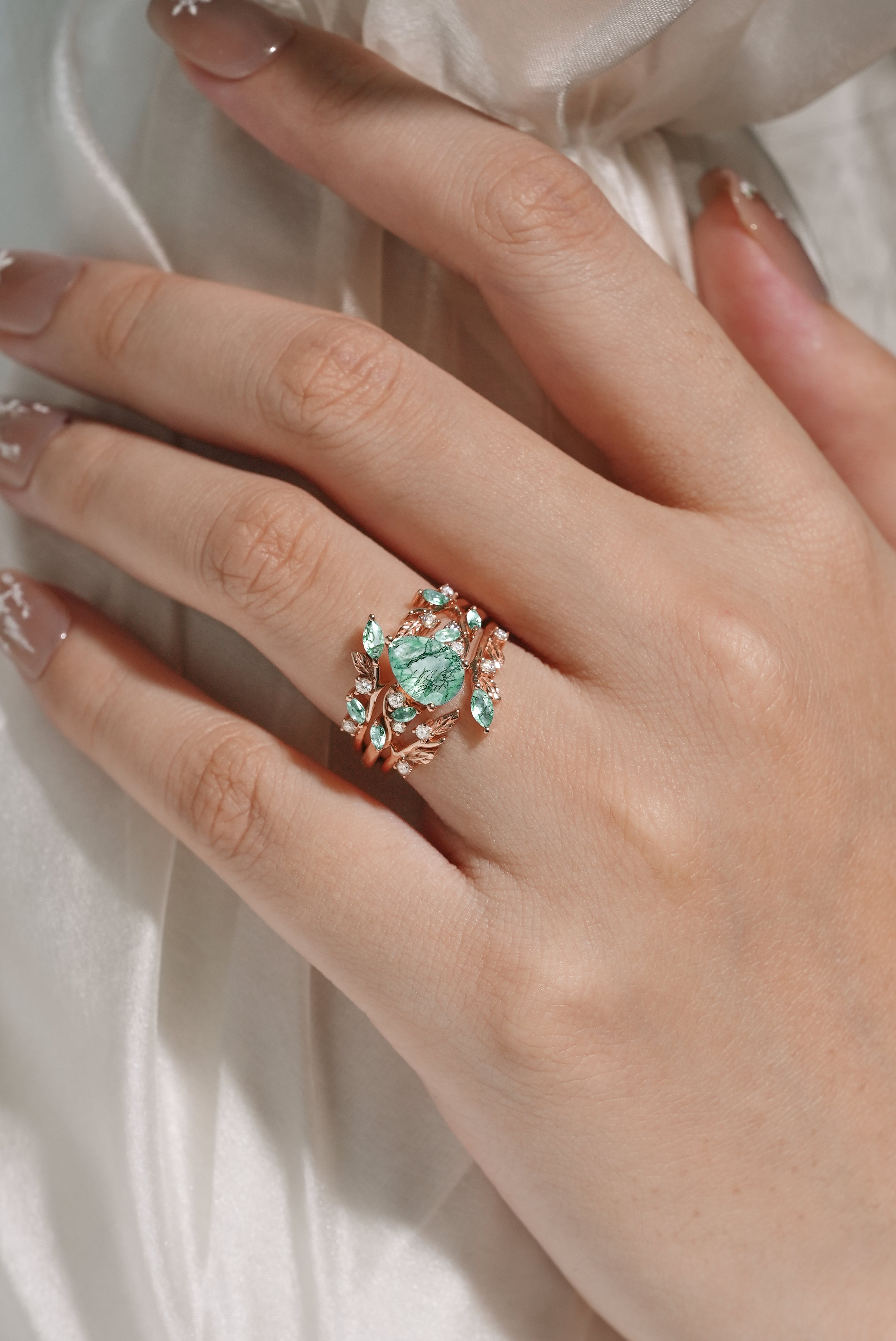 Rose gold moss agate engagement ring set with leaf and moissanite accents, vintage style.