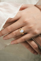 Moissanite leaf engagement ring on a woman's hand, Lahela Jewelry