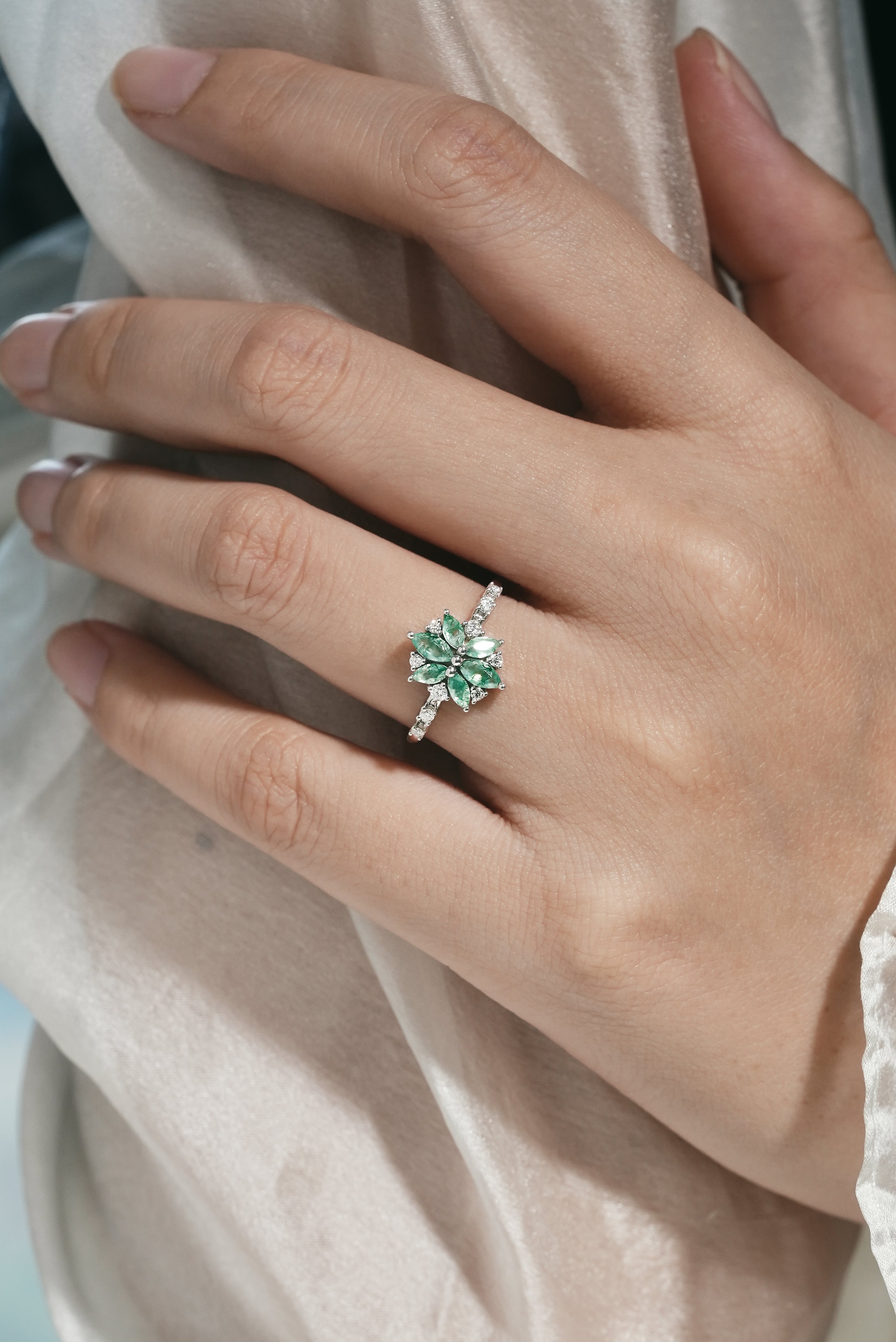 Moss Agate Engagement Ring on a hand