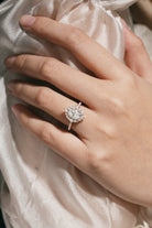 Oval Moissanite Halo Engagement Ring on a hand