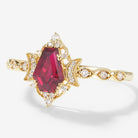 Yellow gold moon-inspired coffin cut ruby engagement ring with moissanite accents, bridal set