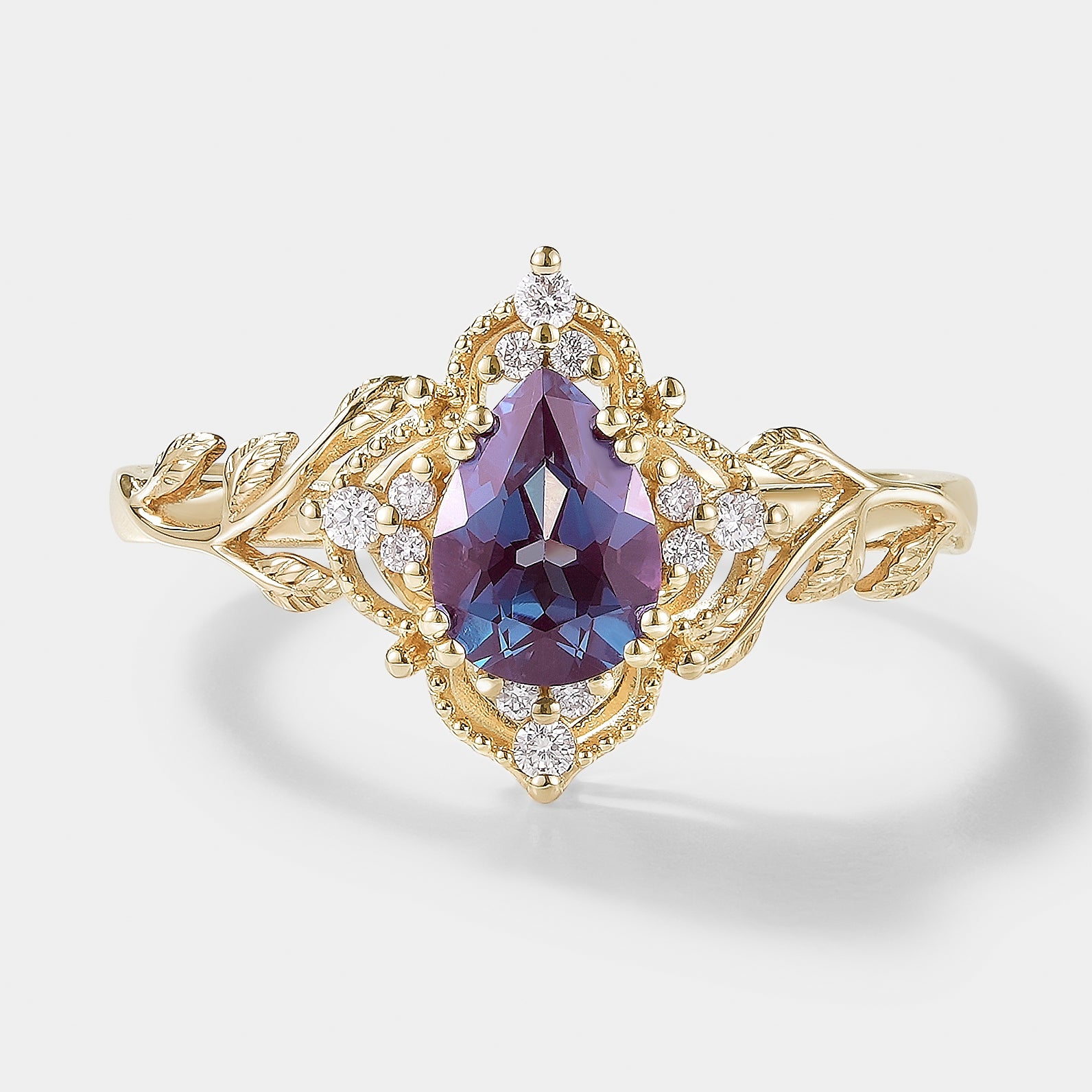 Pear Cut Alexandrite Nature Inspired Leaf Engagement Ring In Yellow Gold