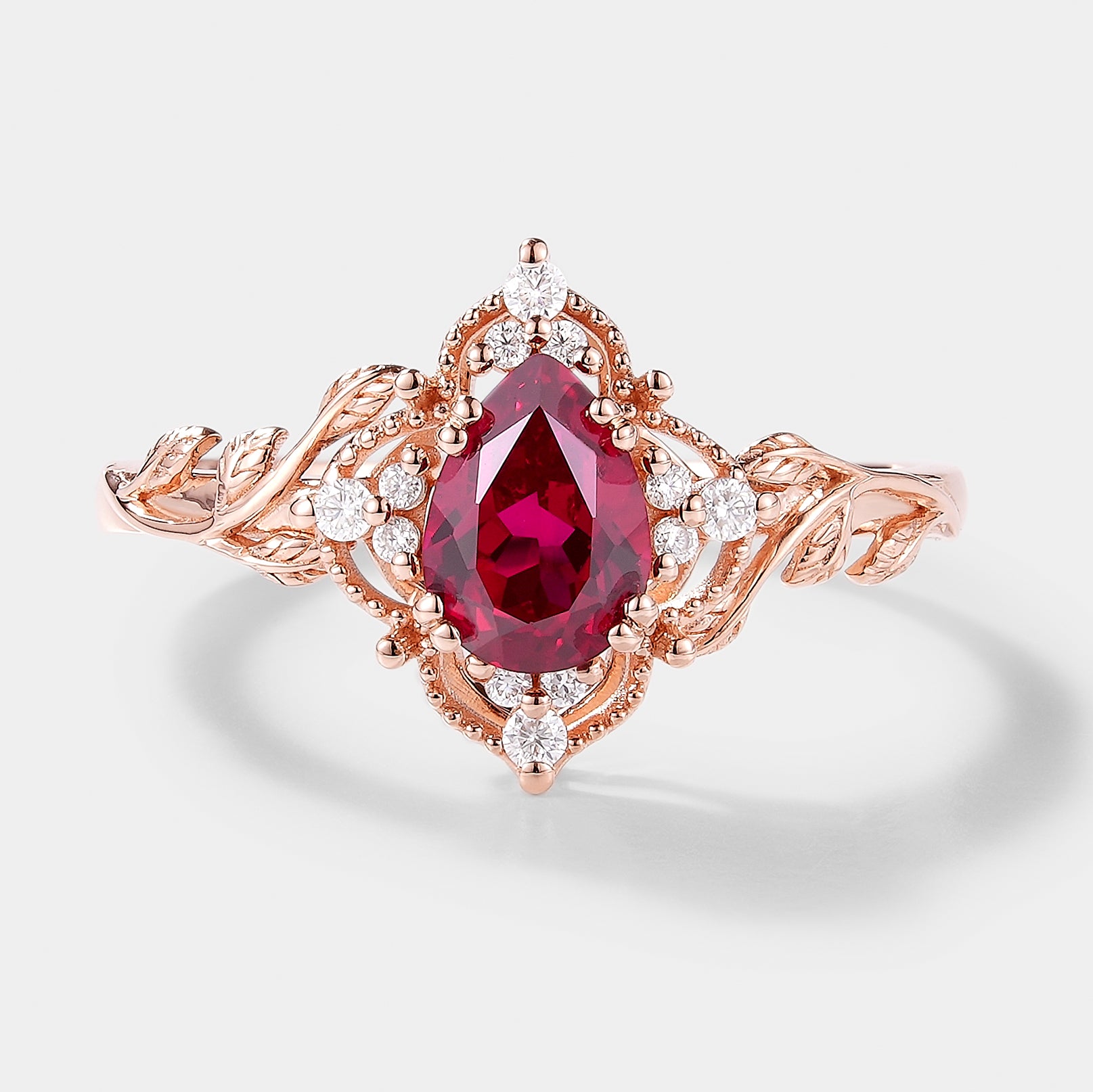 Pear Cut Lab Ruby Engagement Ring with Leaf Detailing