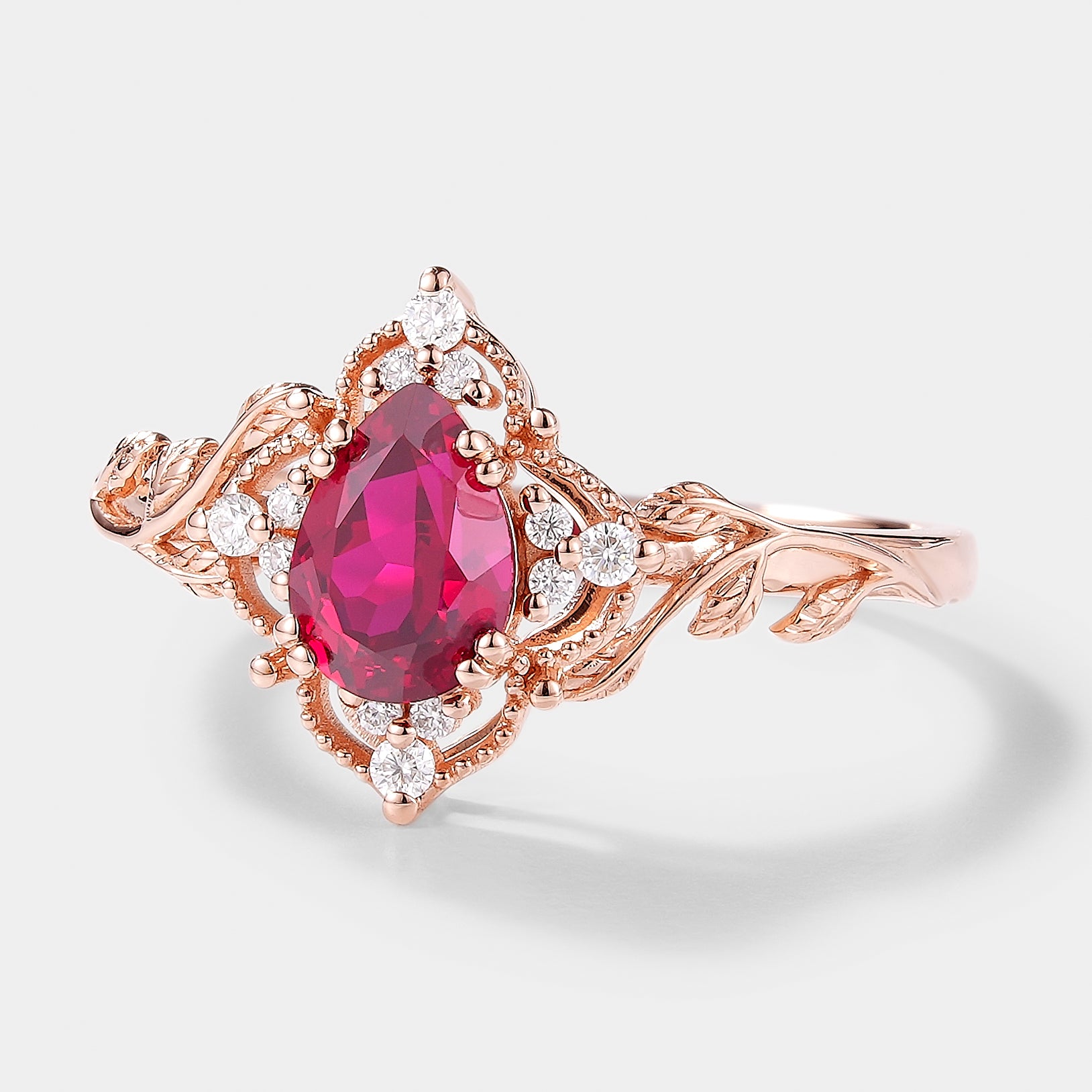 Pear Cut Lab Ruby Ring Nature Inspired Leaf Engagement Ring In Rose Gold