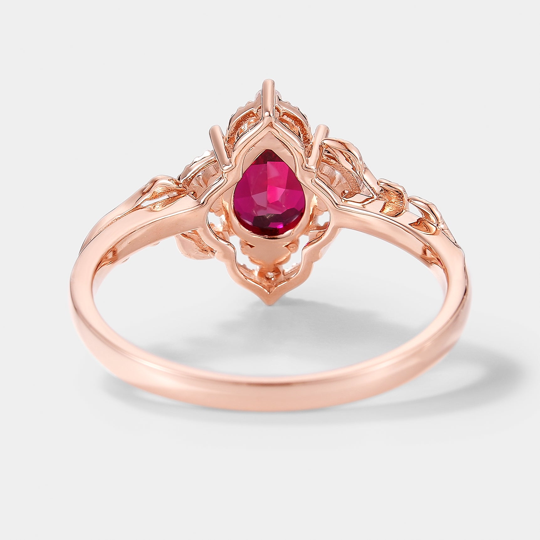 Pear Cut Lab Ruby Ring Nature Inspired Leaf Engagement Ring In Rose Gold