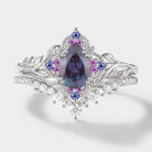 Nature-inspired Alexandrite engagement ring set with leaf detail