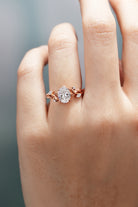 Rose gold leaf engagement ring with oval lab grown diamond