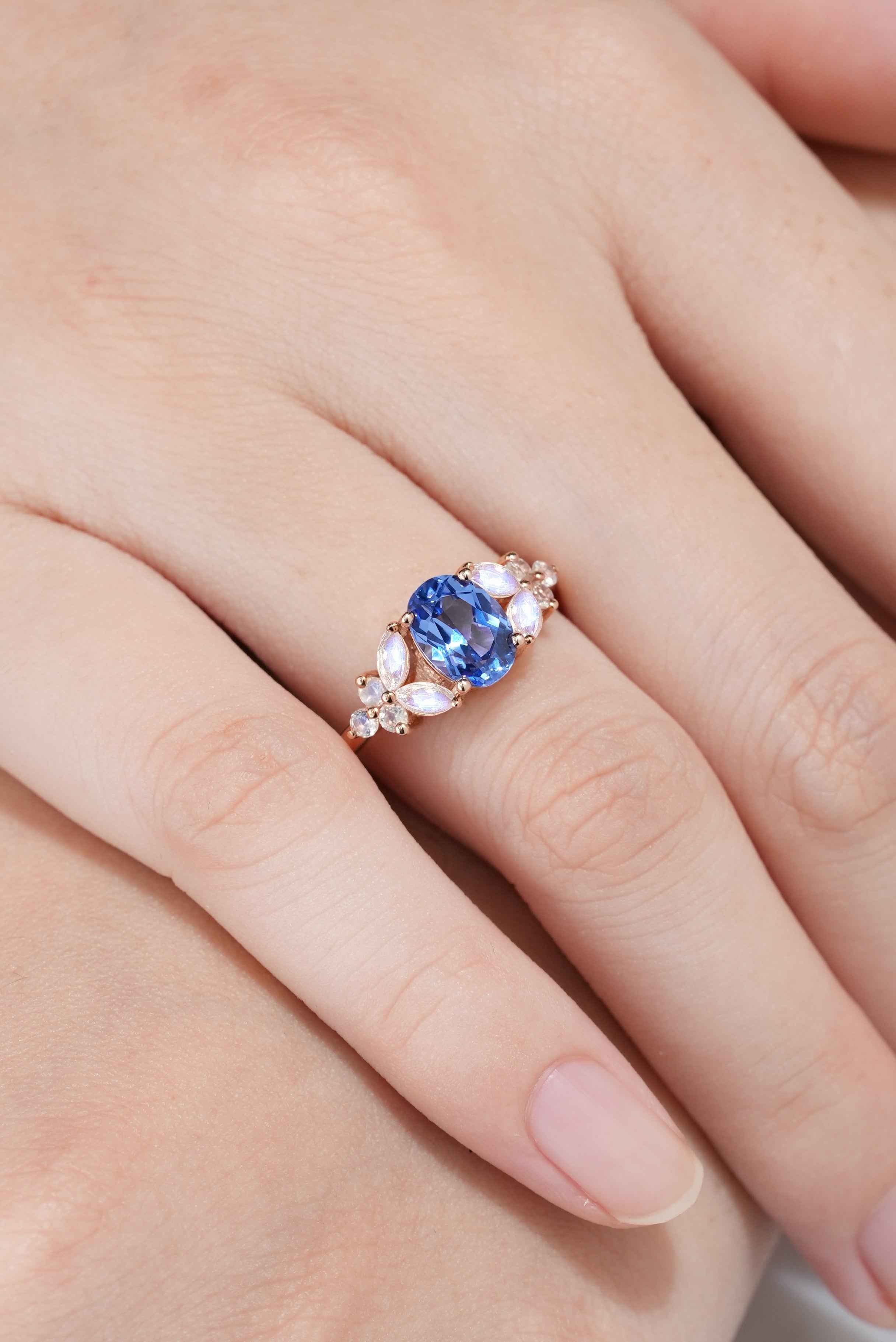 Unique Design Oval Cut Blue Sapphire Engagement Ring Butterfly Moissanite Cluster