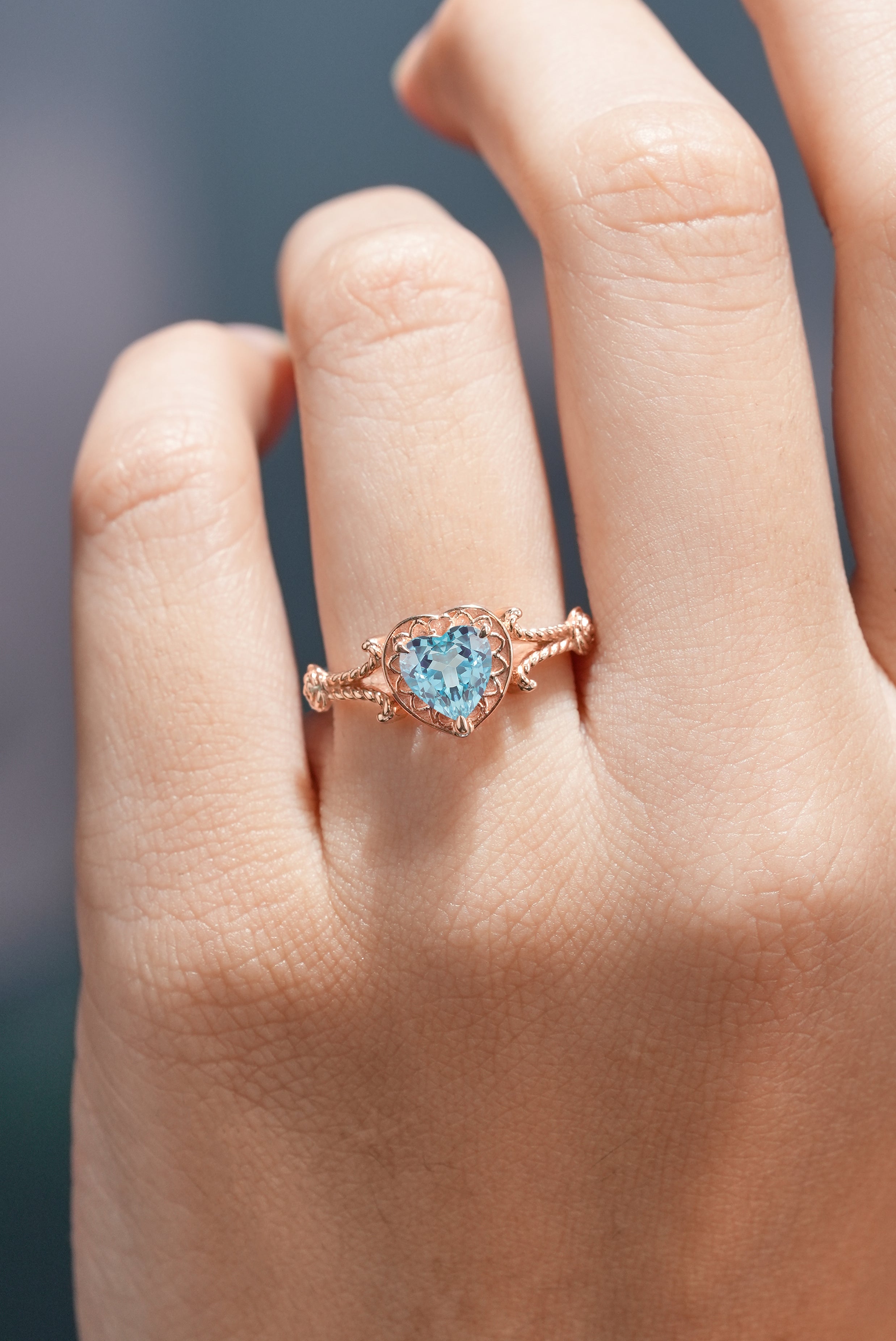 Unique Design Heart Shaped Lab Sapphire Engagement Ring In A Finger