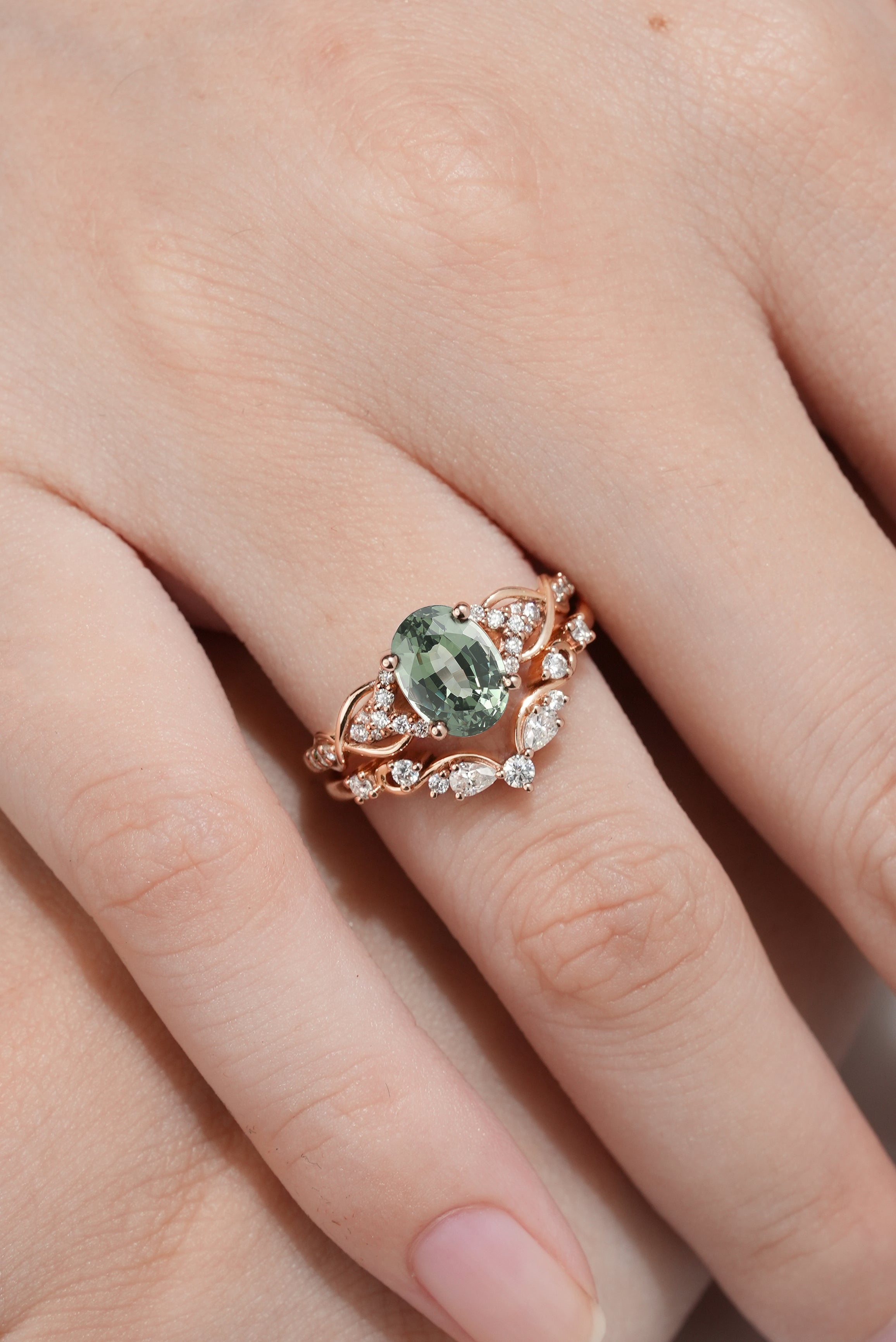 Nature-inspired green sapphire engagement ring set