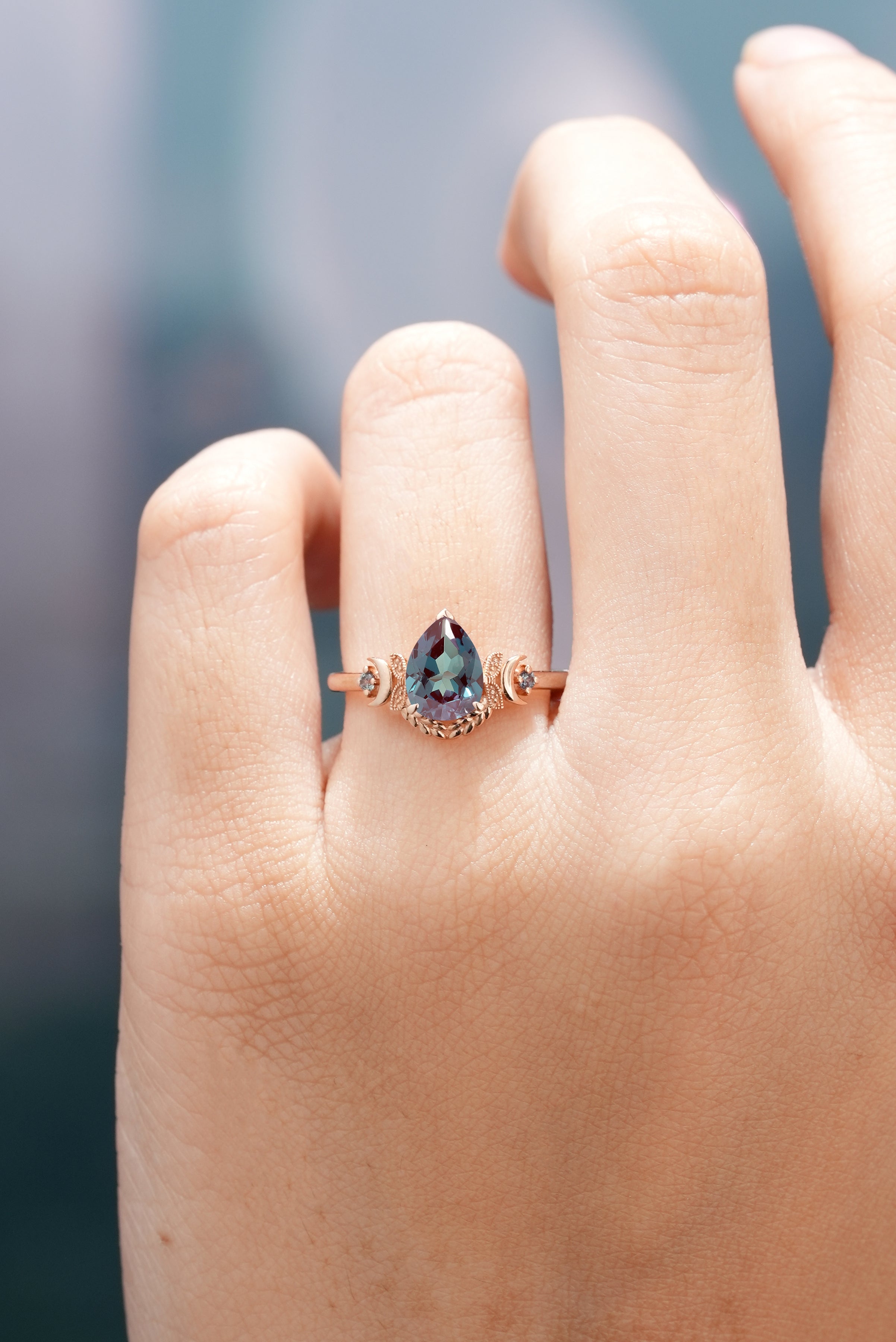 Unique Design Moon Shaped Alexandrite Engagement Ring In A Finger