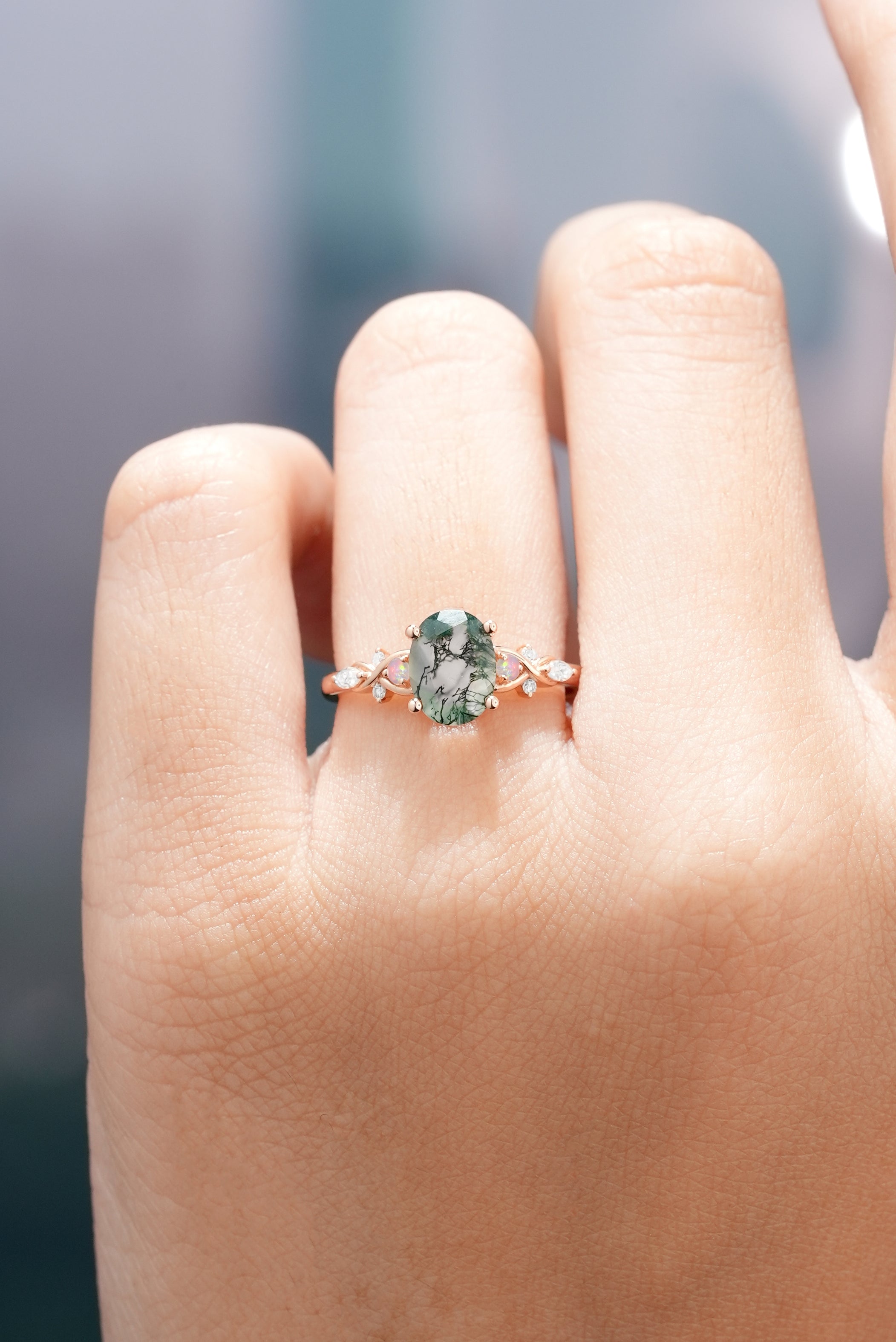 Nature-inspired moss agate engagement ring, rose gold band, opal accents