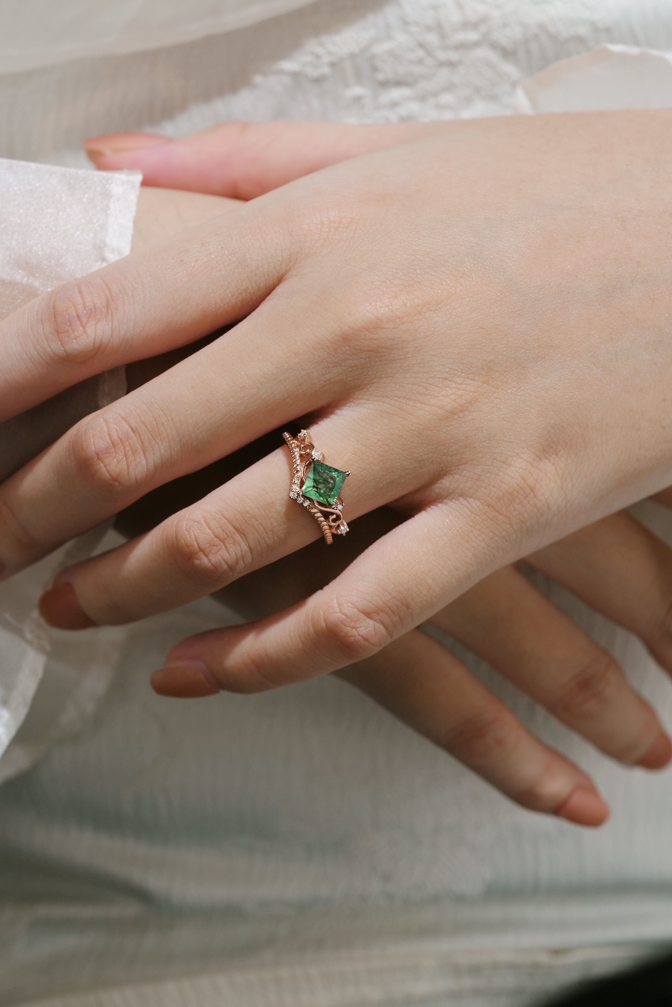 Elegant princess cut moss agate ring on hand