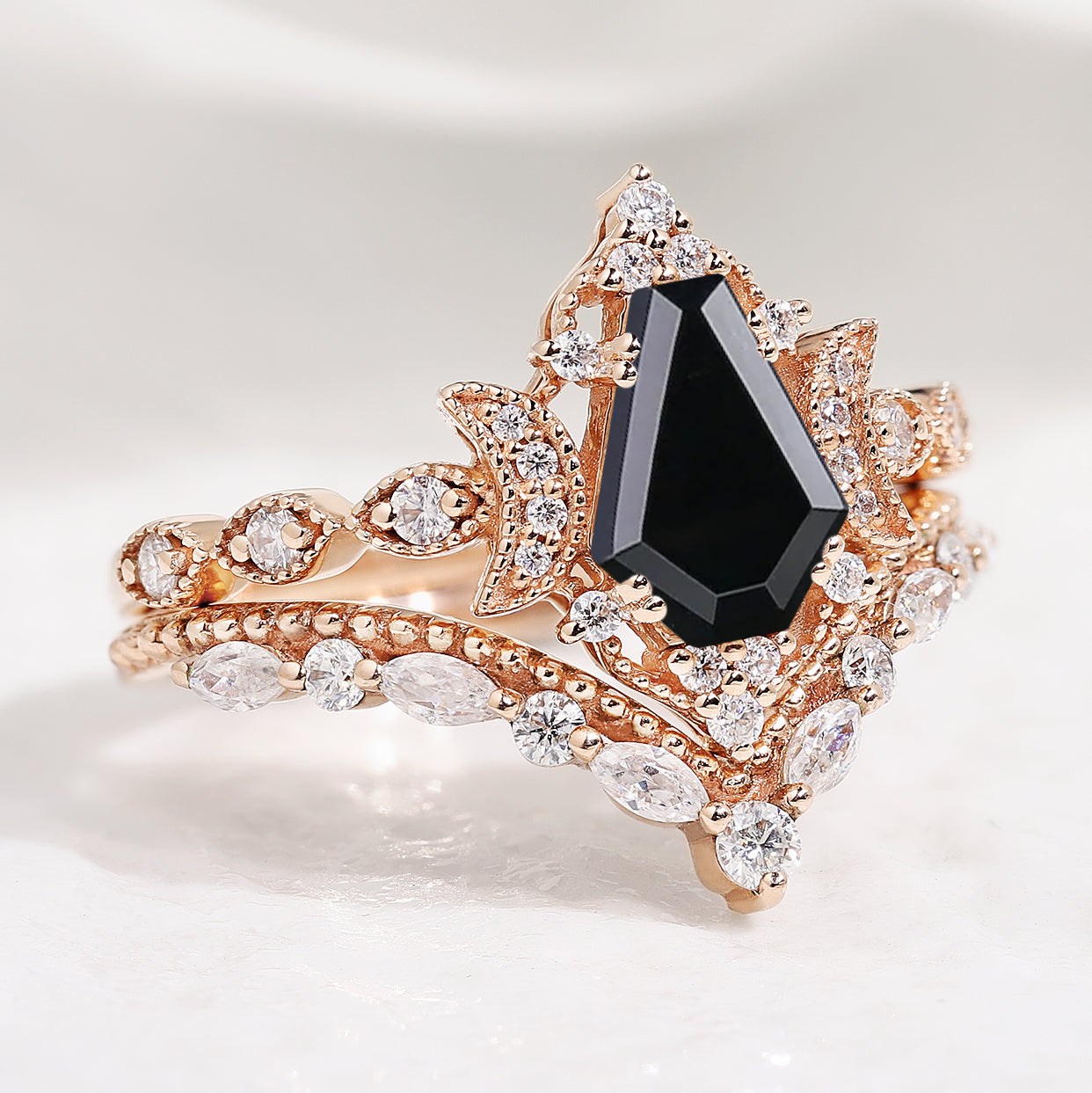 Rose gold moon design engagement ring set with black onyx and moissanite