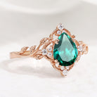 Nature-inspired pear cut lab emerald engagement ring