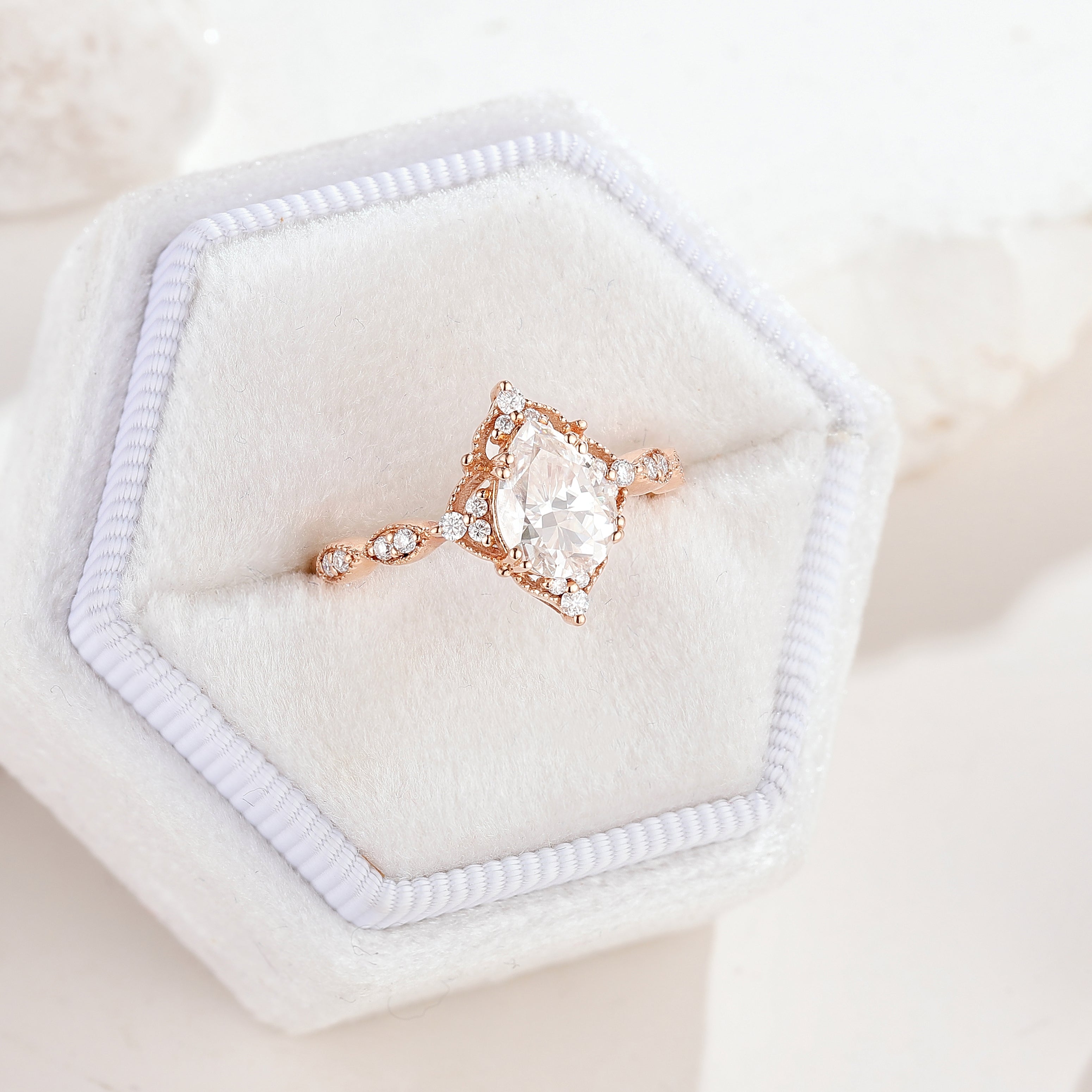 Vintage Pear Cut Moissanite Engagement Ring Rose Gold Ring In A White Ring Box