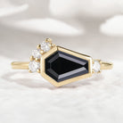 Gold ring with coffin-cut black onyx and diamond accents