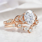 Oval moissanite engagement ring with curved band, rose gold, Lahela Jewelry