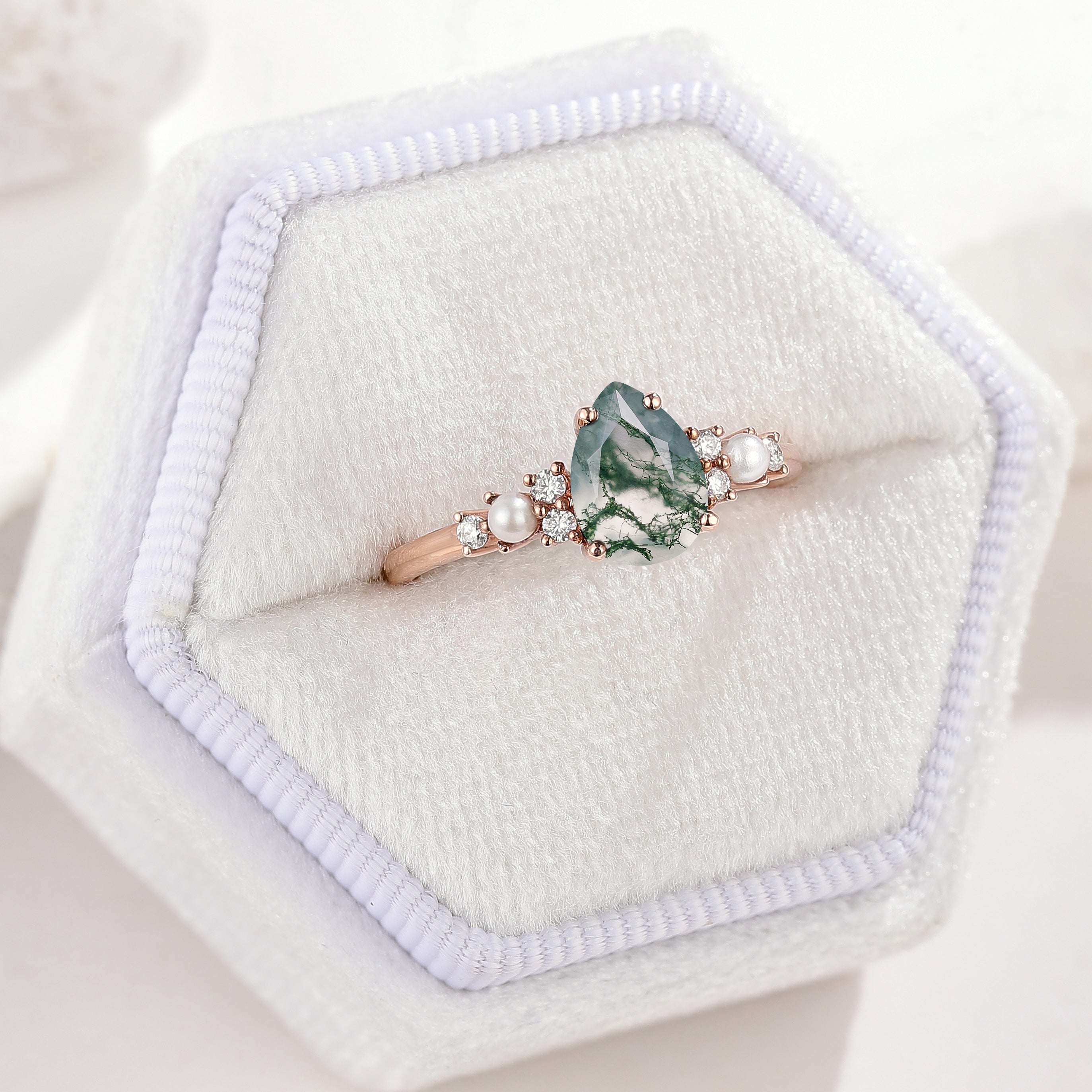 Unique Pear Cut Moss Agate Engagement Ring Moissanite And Pearl Cluster In a White Ring Box