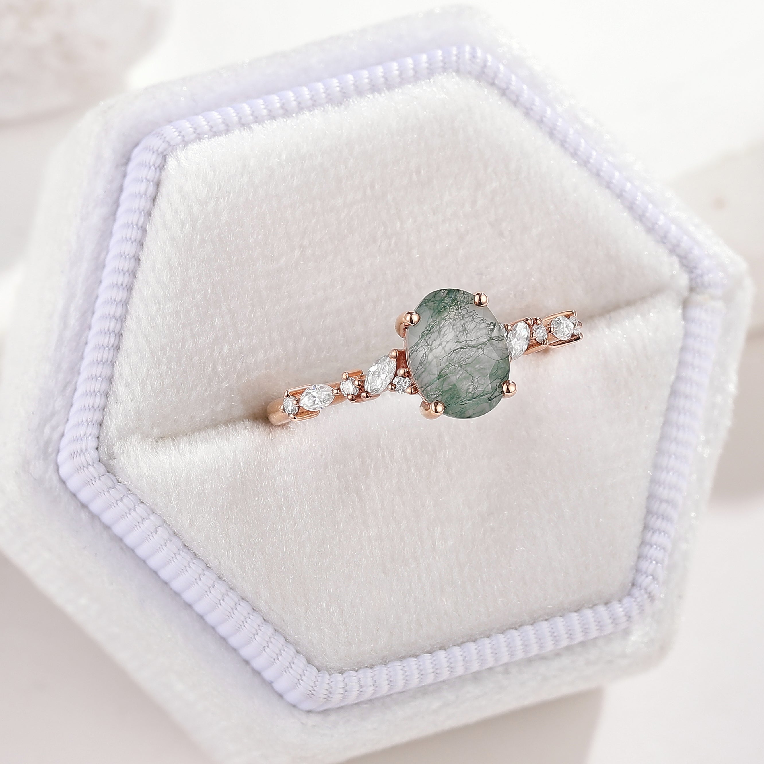 Nature Inspired Oval Cut Moss Agate Engagement Ring Moissanite Cluster In A White Ring Box