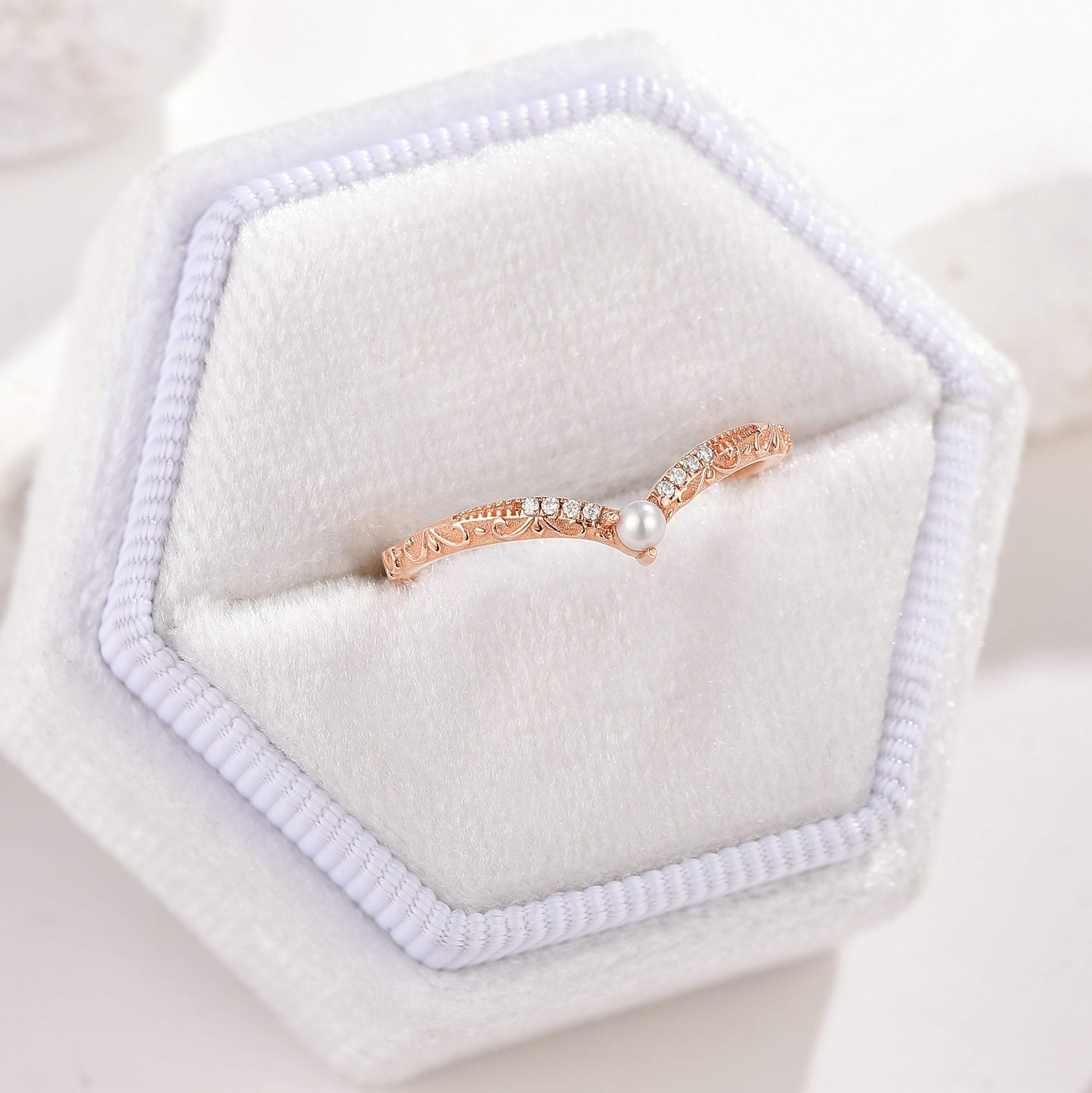 Rose gold chevron wedding band with pearl and moissanite stones