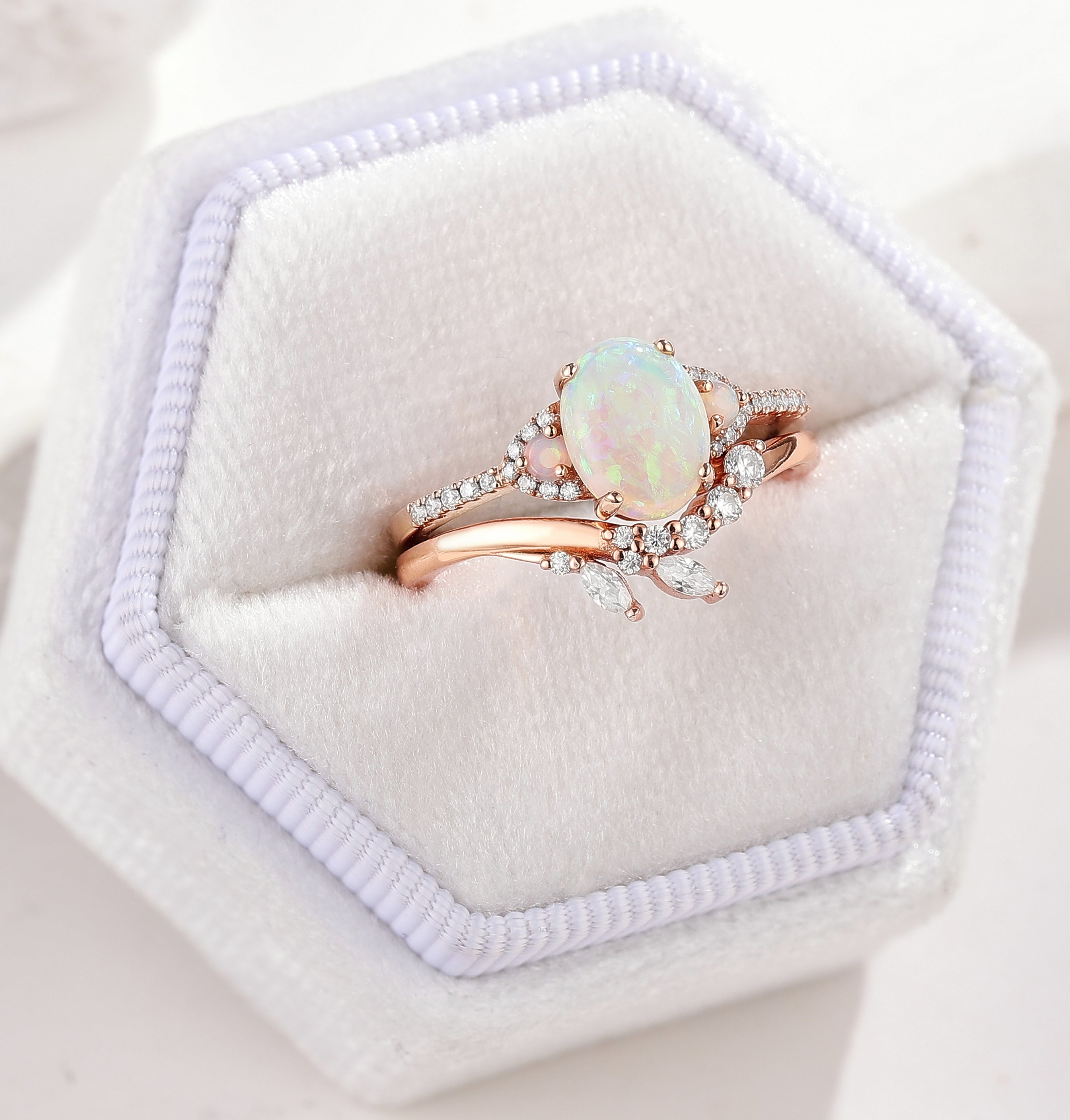 Rose gold opal engagement ring set with leaf design