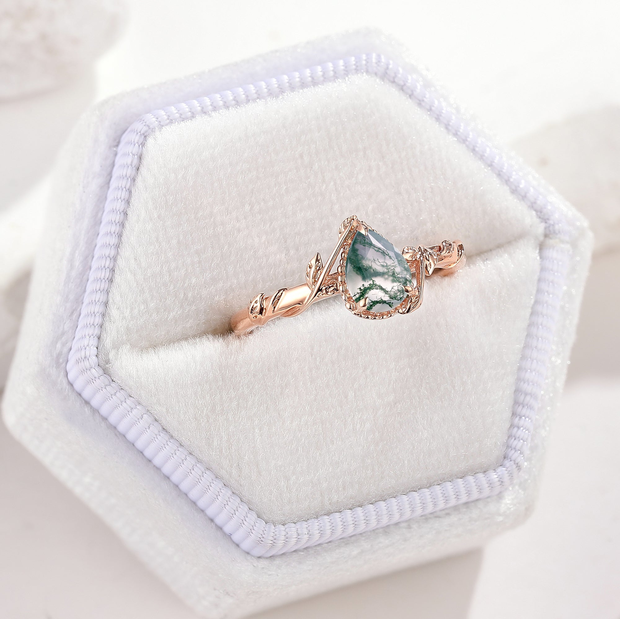 Pear Cut Moss Agate Engagement Ring Nature Inspired Leaf Ring In A White Ring Box