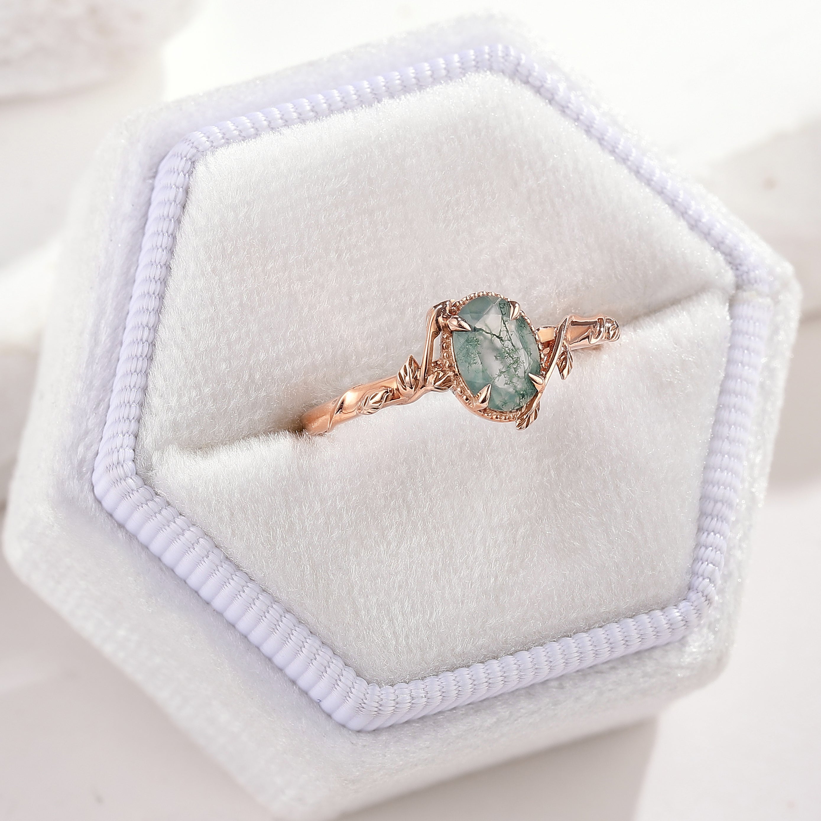 Oval Cut Nature Inspired  Leafy Moss Agate Engagement Ring In A White Ring Box