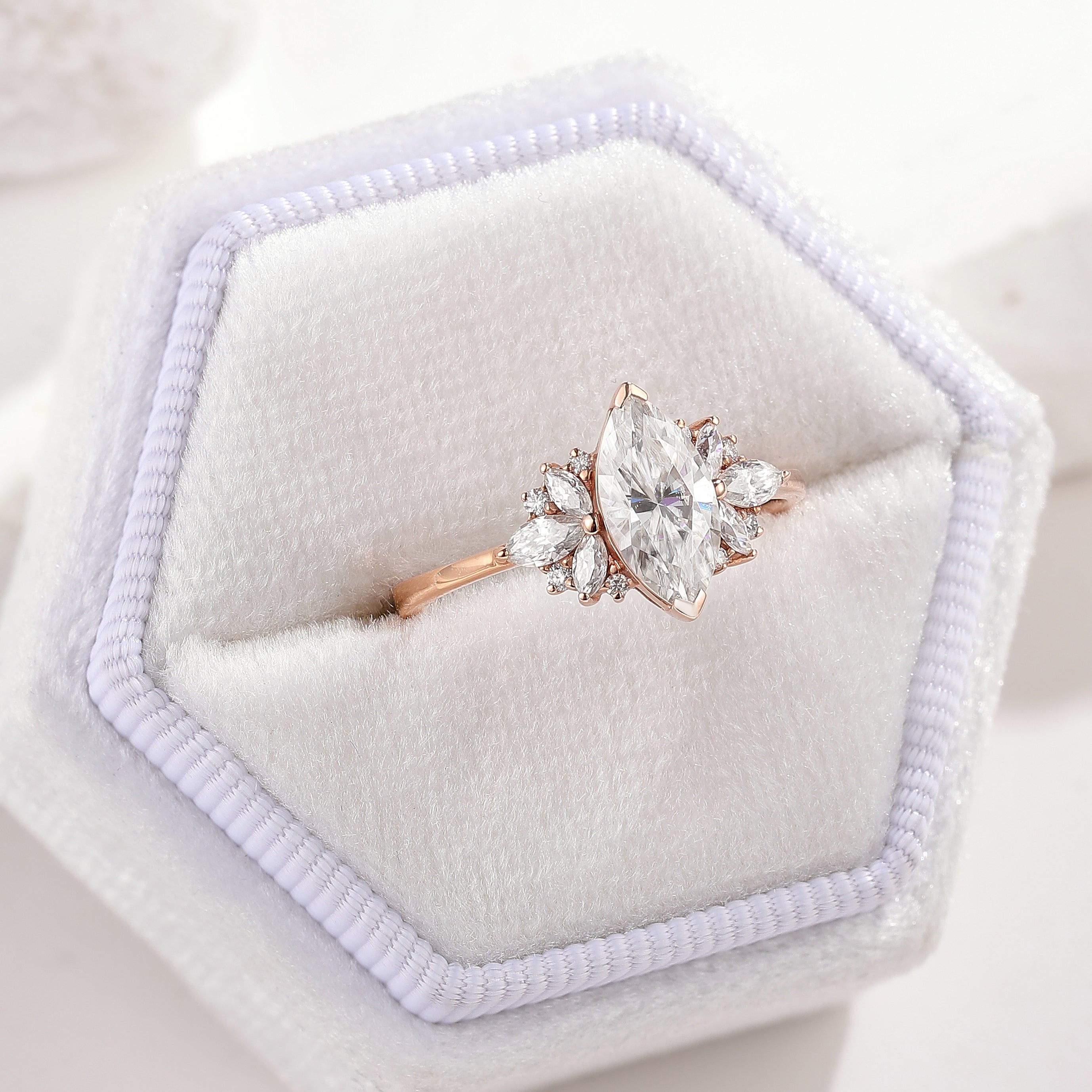 Unique Marquise Cut Moissanite Engagement Ring In A White RIng Box