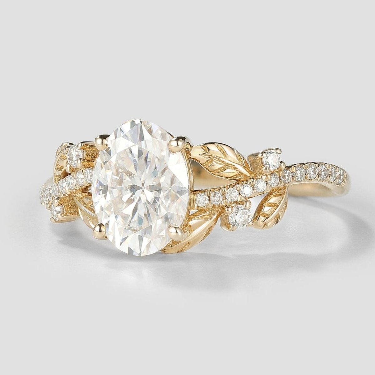 Nature Inspired Oval Cut Moissanite Engagement Ring Leaf Ring In Yellow Gold