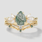 Nature-inspired pear cut moss agate engagement ring set