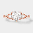 Heart-cut moissanite ring with leaf-design details