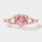 Heart-shaped Padparadscha engagement ring with floral accents