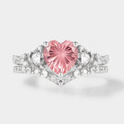 Heart-cut Padparadscha ring set with moissanite