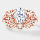 Nature-inspired leaf engagement ring set with oval moissanite