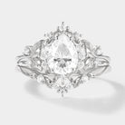 Leaf-inspired pear cut moissanite engagement ring set
