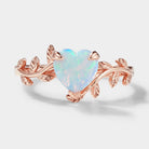 Heart-cut opal engagement ring with leaf design by Lahela Jewelry
