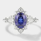 Oval Royal Blue Sapphire Engagement Ring with Iris Accents