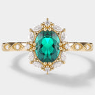 Vintage Oval Cut Emerald Engagement Ring with Moissanite Cluster