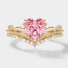 Heart-cut Padparadscha sapphire engagement ring set