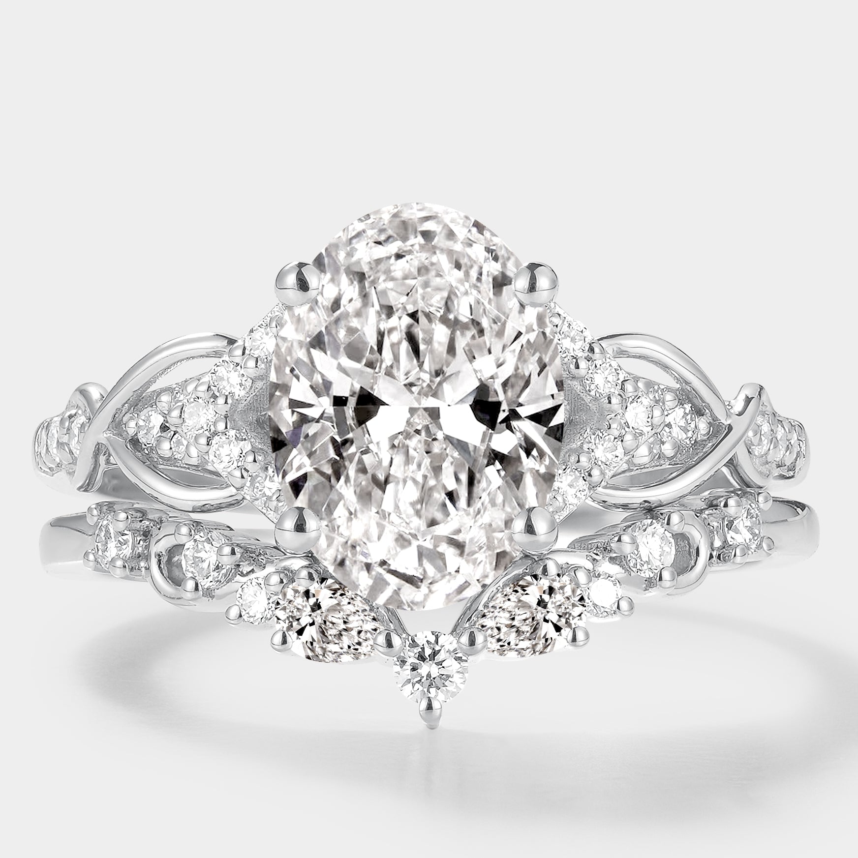 Elegant oval cut lab grown diamond ring set with leaf design