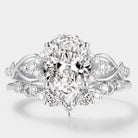 Elegant oval cut lab grown diamond ring set with leaf design